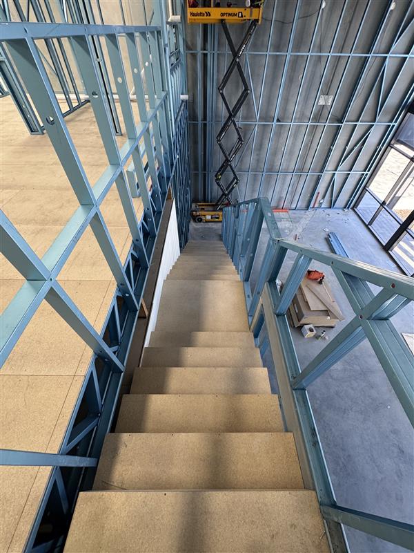 Steel frame with a stair void inside a residential build